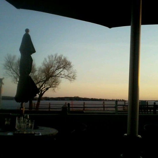 Photo taken at Sunsets on Wayzata Bay by Elizabeth B. on 3/15/2012