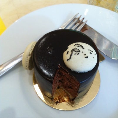 Photo taken at The Manna House Bakery &amp; Patisserie by Robbie on 7/24/2012
