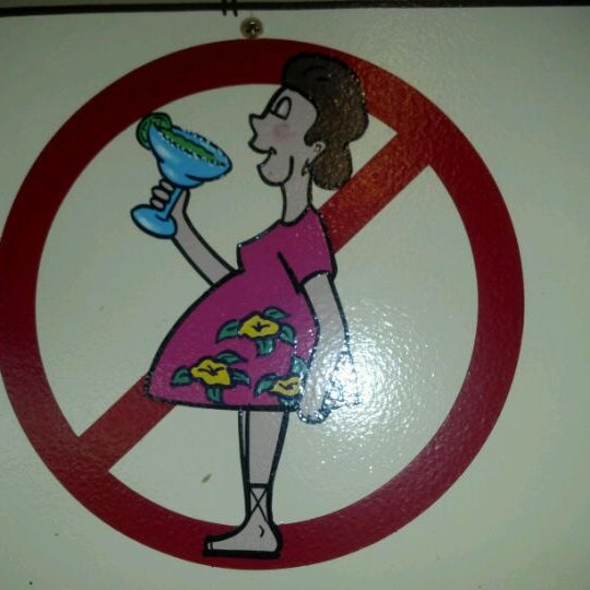 While having a drink at the bar.....play find the "Fat People Should Not Drink Here Sign"!