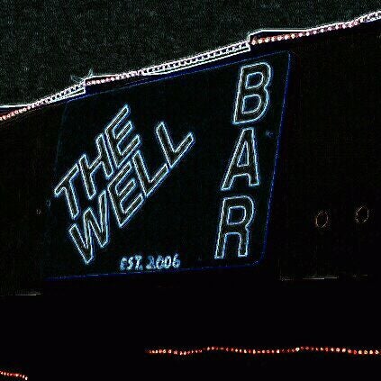 Photo taken at The Well Bar by Vanessa M. on 3/18/2012