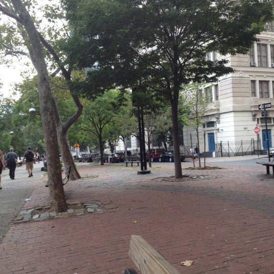 Photo taken at SoHo Square Park by Gloria on 8/22/2012