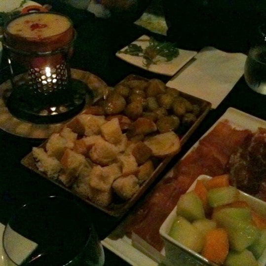 Photo taken at Fondue Cowboy by William L. on 2/17/2012