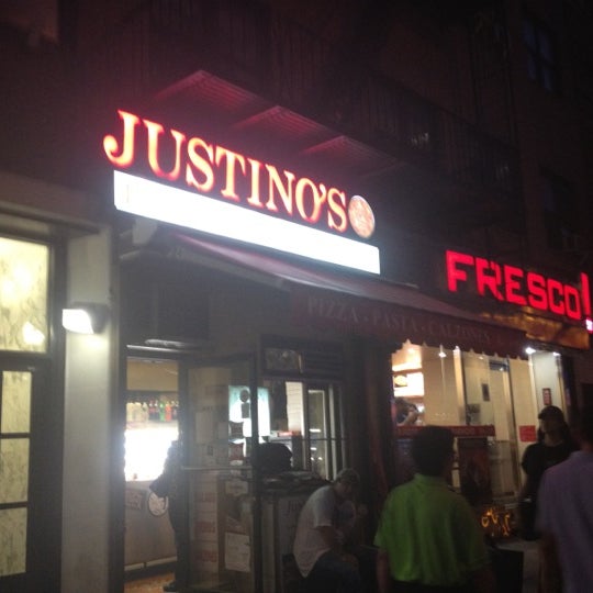 Photo taken at Justino&#39;s Pizzeria by Tina D. on 7/19/2012