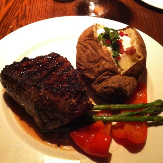 Photo taken at The Keg Steakhouse + Bar - Leslie Street by Buzz S. on 9/8/2012