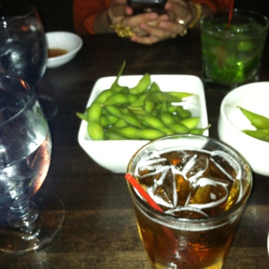 Photo taken at Ozu Japanese Cuisine &amp; Lounge by Maddie G. on 6/16/2012