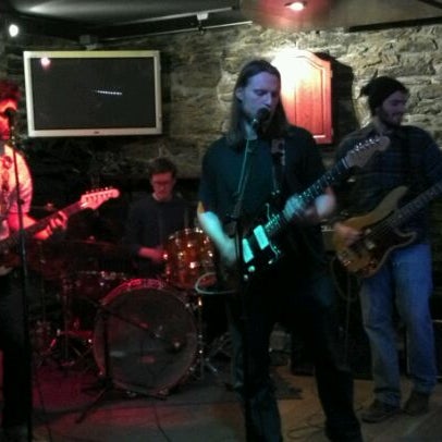 Photo taken at Two Brothers Tavern by Lindsey C. on 4/7/2012
