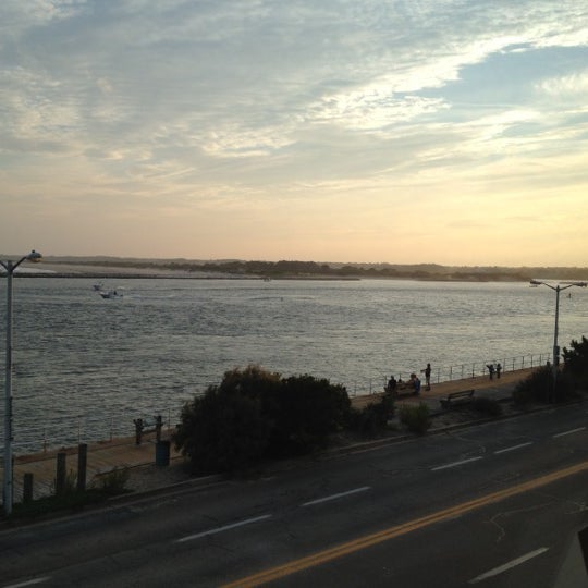 Photo taken at Harrison&#39;s Harbor Watch Restaurant &amp; Raw Bar by Justin W. on 8/10/2012