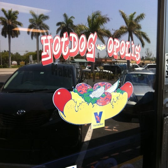 Photo taken at Hotdog-Opolis by Kelly C. on 4/12/2012