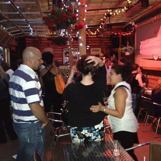 Photo taken at Cadillac Lounge by Social Media Concierge S. on 5/25/2012