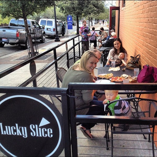 Photo taken at Lucky Slice Pizza by Tyler on 9/1/2012