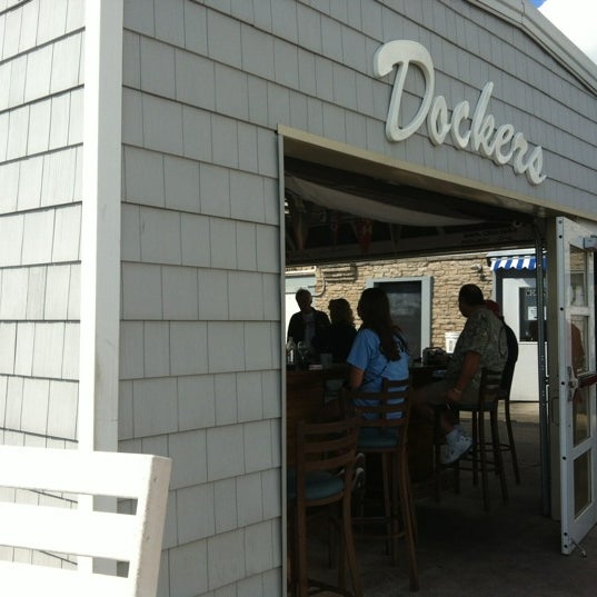 Photo taken at Dockers Waterfront Restaurant &amp; Bar by Carina D. on 9/8/2012