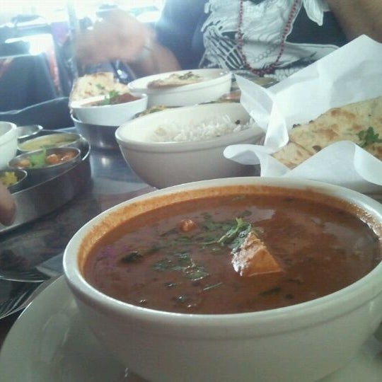 Photo taken at New India Cuisine by Michelle E. on 3/16/2012