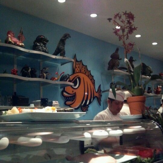 Photo taken at Monster Sushi by Adrienne C. on 5/15/2012