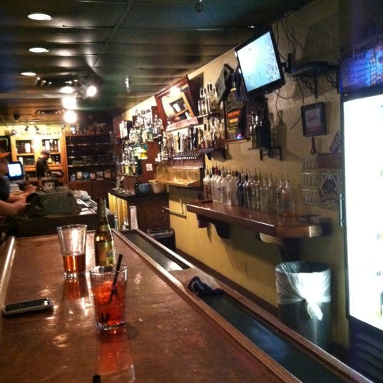 Photo taken at Uptown Pubhouse by Carrie E. on 5/12/2012
