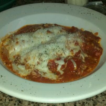 Photo taken at Rocco&#39;s Uptown Pizza &amp; Pasta by Megan K. on 2/27/2012