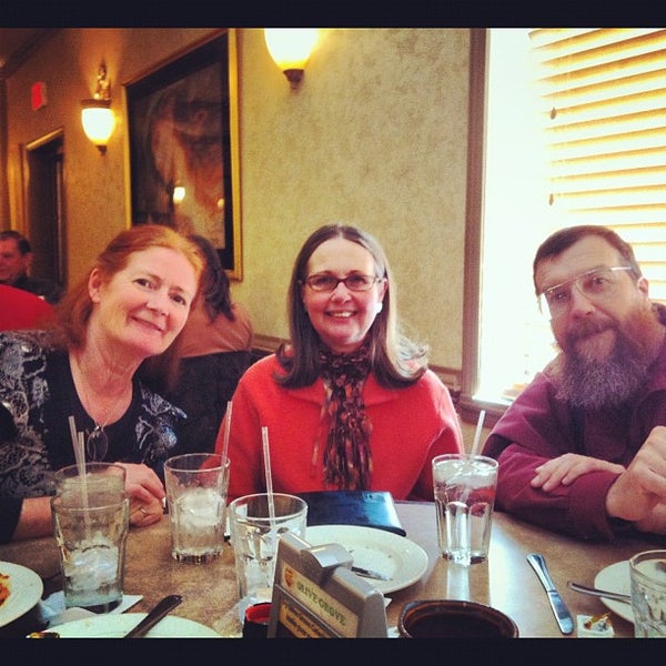Photo taken at Olive Grove Restaurant &amp; Lounge by Benjamin J. on 2/26/2012
