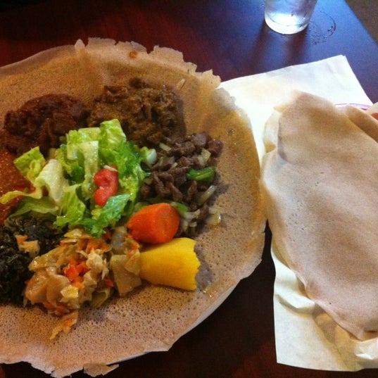 Photo taken at Enat Ethiopian by Max T. on 8/27/2012