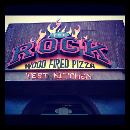 Photo taken at The Rock Wood Fired Pizza by Reist M. on 9/1/2012