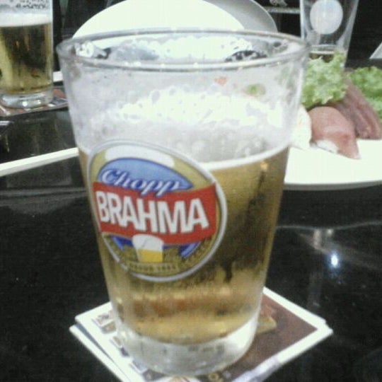 Photo taken at Quiosque Chopp Brahma by Chandall V. on 4/4/2012