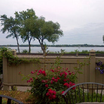 Photo taken at Sunsets on Wayzata Bay by Well Fed Guide T. on 6/16/2012