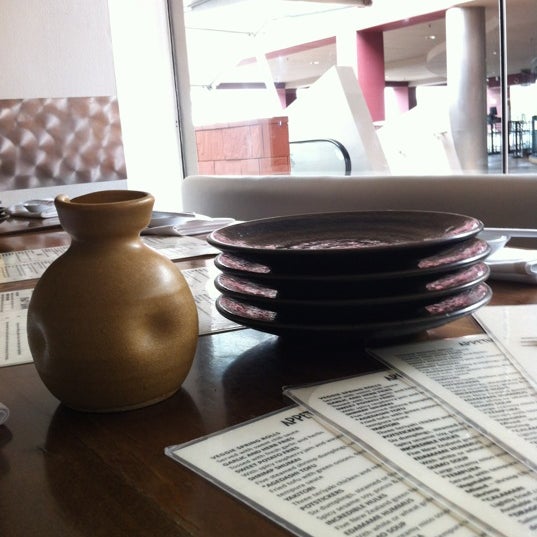 Photo taken at Sushi On The Rock by Craig A. on 6/12/2012