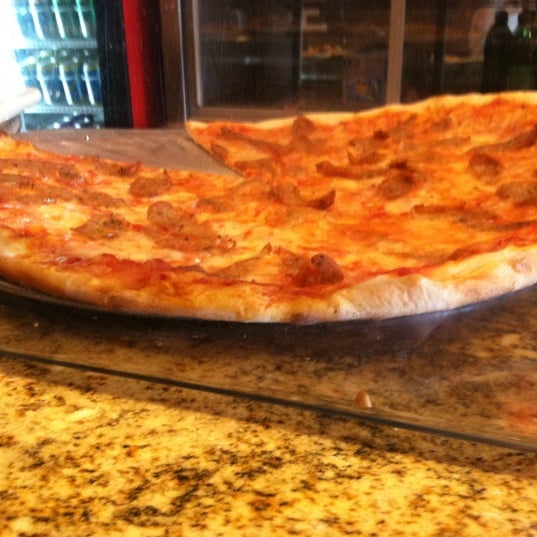 Photo taken at Rome Pizzeria &amp; Grill by Adolfo R. on 5/17/2012