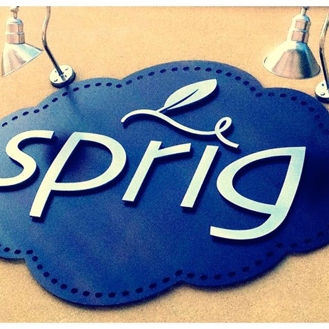 Photo taken at Sprig Restaurant by Laura D. on 3/23/2012