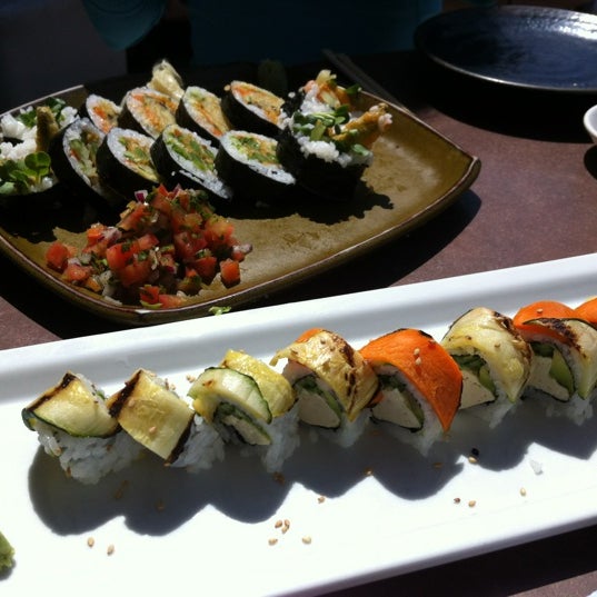Photo taken at Sushi On The Rock by John C. on 8/3/2012