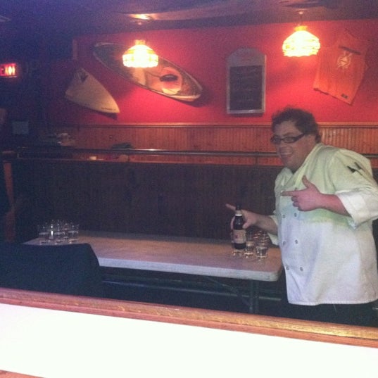 Photo taken at BoneYard Bar &amp; Grill by Matthew Y. on 5/10/2012