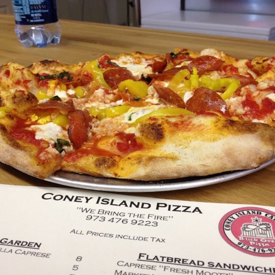 Photo taken at Coney Island Pizza by J_ on 4/25/2012