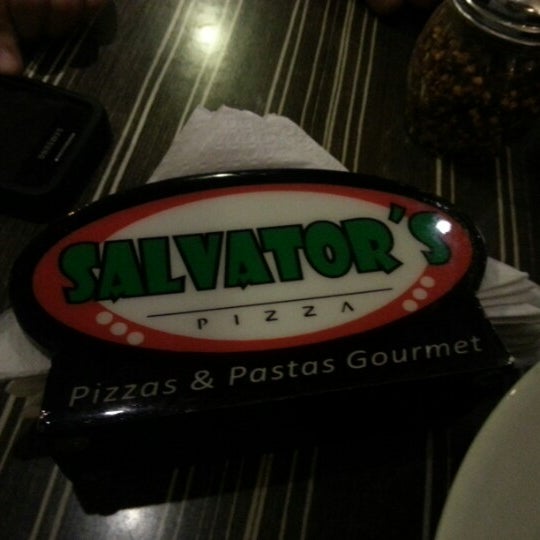 Photo taken at Salvator&#39;s Pizza by Adriana I. on 7/29/2012