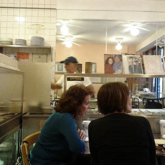 Photo taken at Azuri Cafe by Laurent R. on 6/3/2012