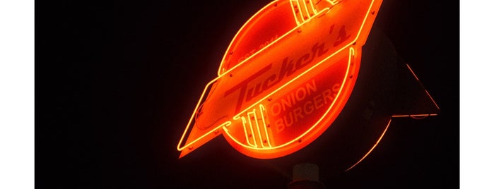 Tucker's Onion Burgers is one of Must Visit Places.