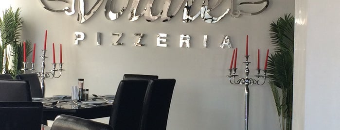 Volare Pizzeria is one of Muscat.