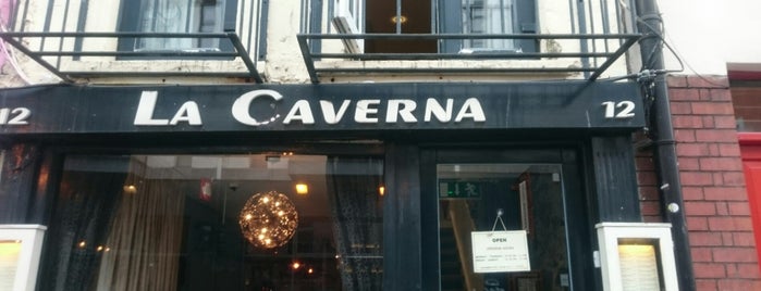 La Caverna Restaurant and Wine Bar is one of Lugares favoritos de Arne.