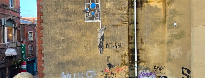Banksy's "Well-Hung Lover" is one of Lil Bits of Bristol.