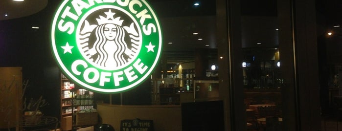 Starbucks is one of สถานที่ที่ Neil ถูกใจ.