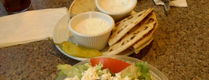 Greek Town Family Restaurant is one of Tempat yang Disukai Emily.