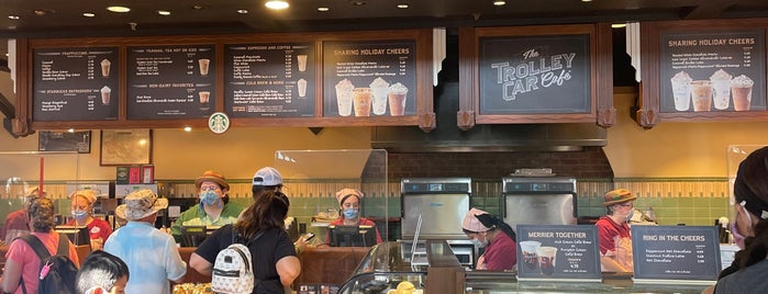 The Trolley Car Café (ft. Starbucks) is one of Tempat yang Disukai Lindsaye.