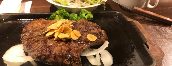Ikinari Steak is one of สถานที่ที่ daqla ถูกใจ.