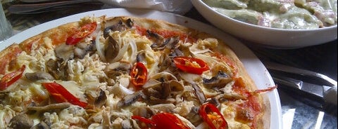 Pizza Bagus is one of Tempat yang Disukai Remy Irwan.