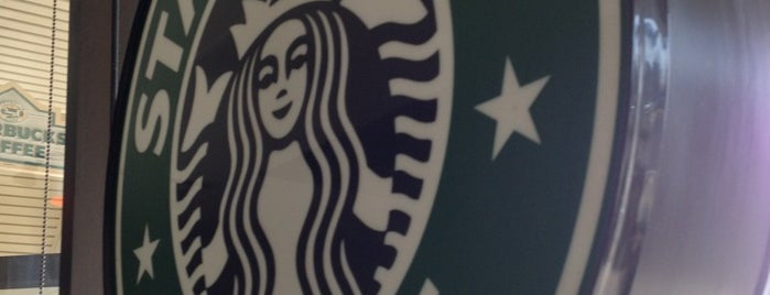 Starbucks is one of Locais curtidos por Reina.