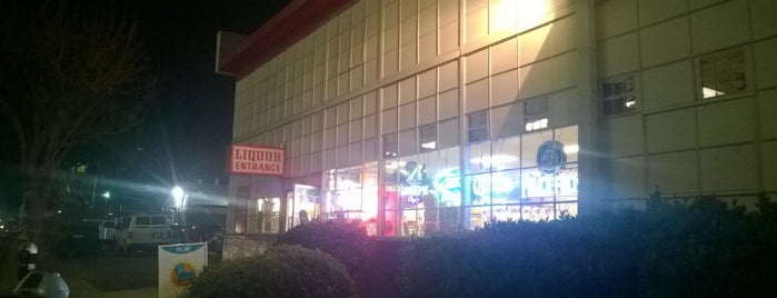 Purdy's Liquor Store, Deli & Gifts is one of Tempat yang Disukai E.