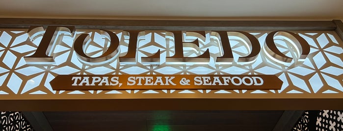 Toledo - Tapas, Steak & Seafood is one of Tempat yang Disukai Andrew.
