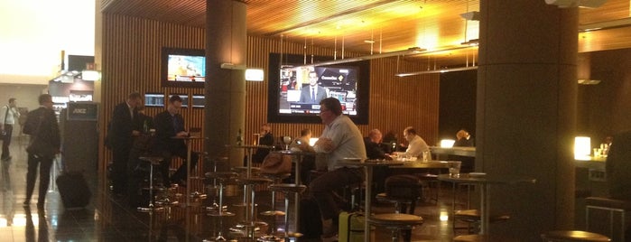 Qantas Club is one of Places to charge your phone.