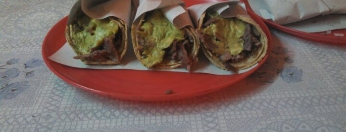 Tacos Los Chuchos is one of Tempat yang Disukai Sandy M..