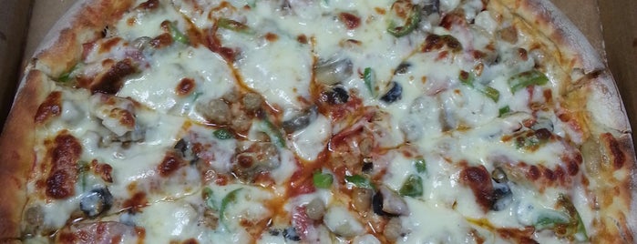 Dana's Pizza is one of Lugares favoritos de Eric.