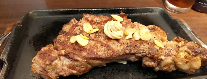 Ikinari Steak is one of Kazu : понравившиеся места.