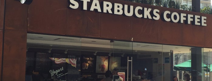 Starbucks is one of Orte, die Laura gefallen.