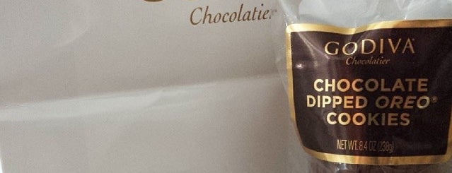 Godiva Chocolatier is one of Tempat yang Disukai James.